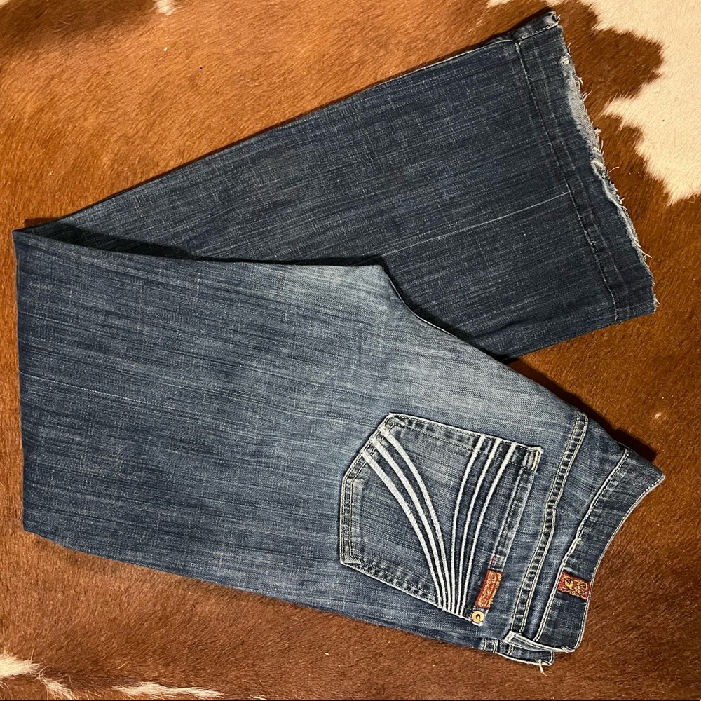 7 For All Mankind, woman’s jeans.